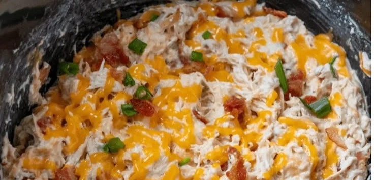 Creamy Crockpot Crack Chicken served with herbs and spices