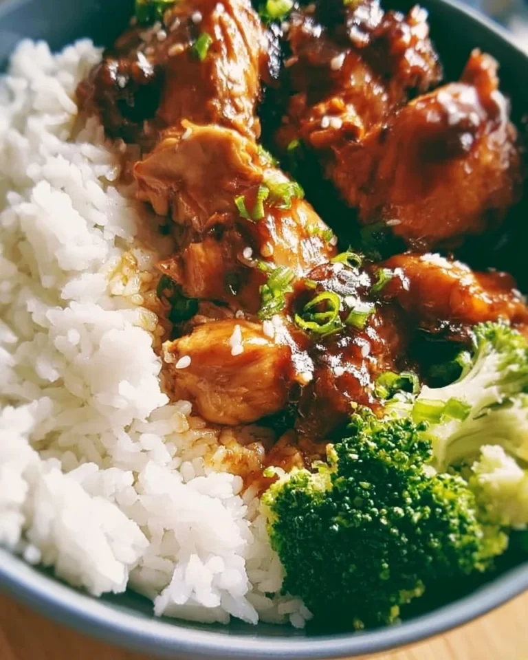Easy crockpot teriyaki chicken served with rice and vegetables